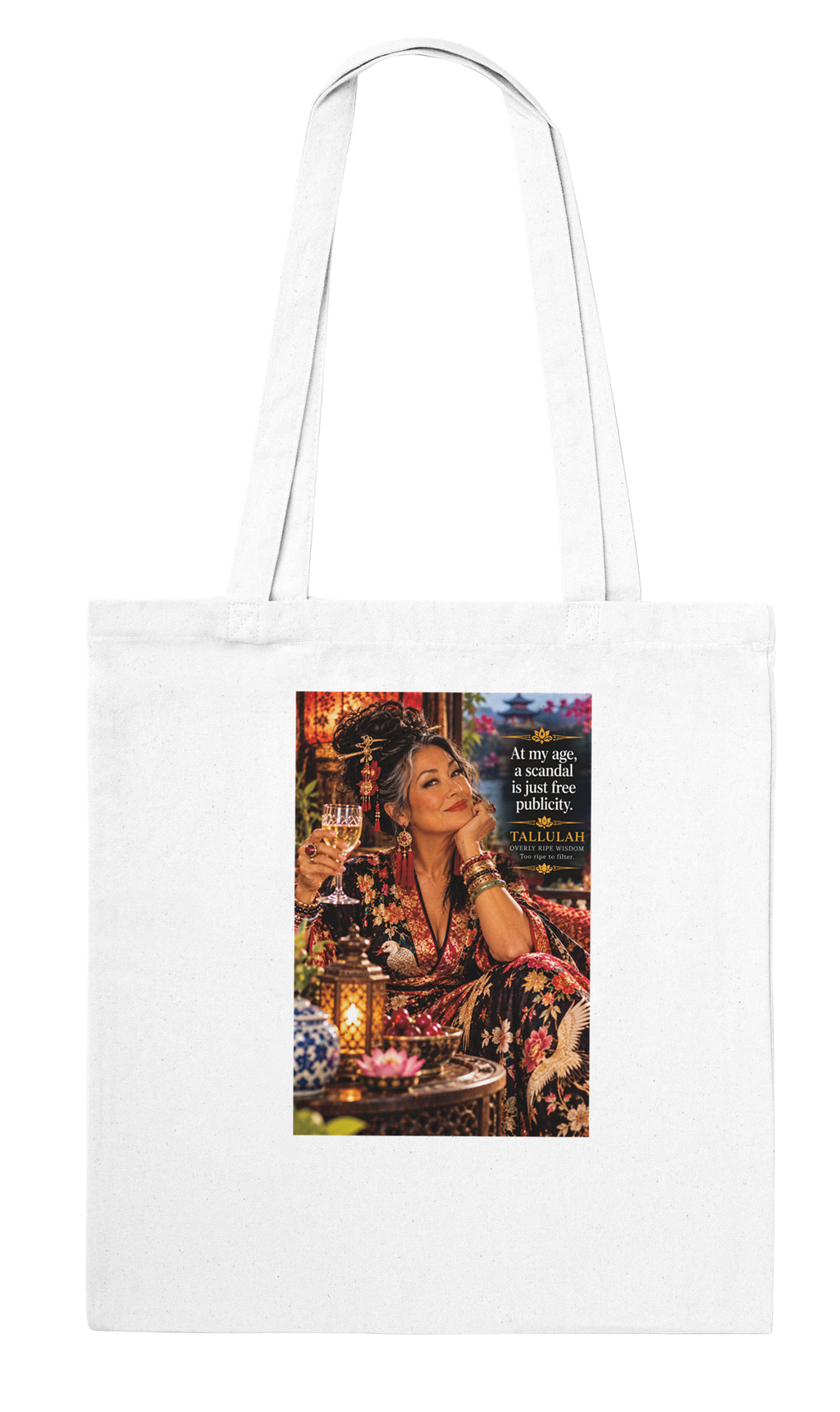 Tallulah from Overly Ripe Wisdom on a tote bag with her saying “At my age, a scandal is just free publicity.”