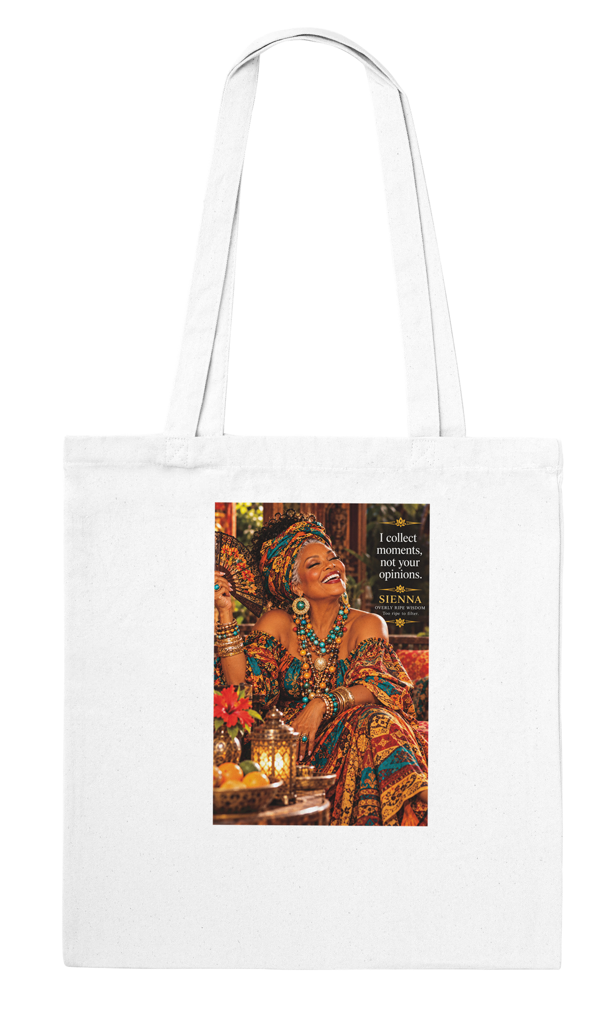 Sienna from Overly Ripe Wisdom on a tote bag with her saying “I collect moments, not your opinions.”