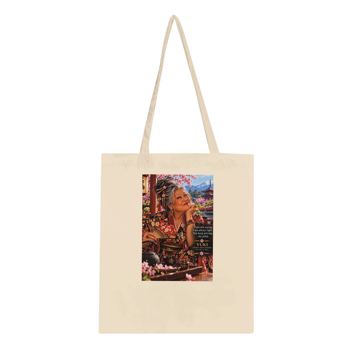 Yuki from Overly Ripe Wisdom on a tote bag with her saying “I am not saying I am always right. You keep proving my point.”